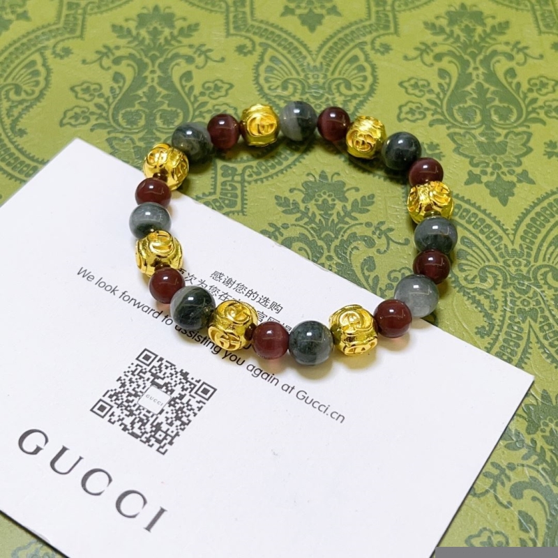 G*u*i bracelets